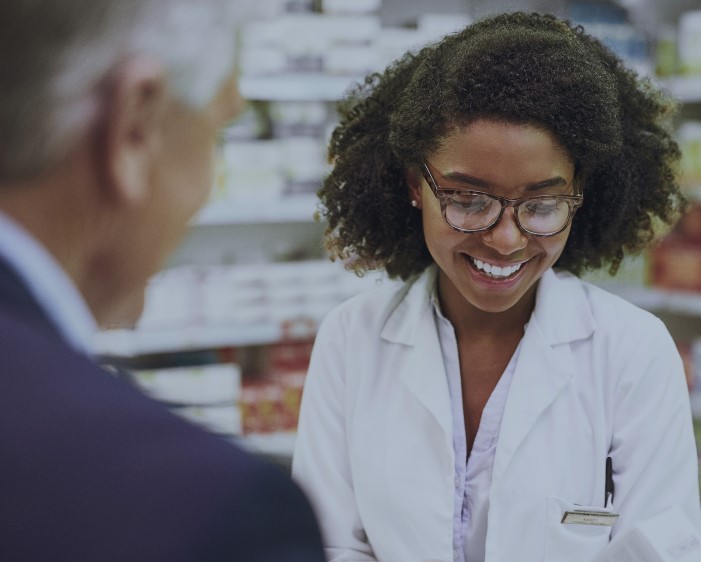 Pharmacist helping a patient