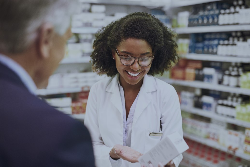 Pharmacist helping a patient