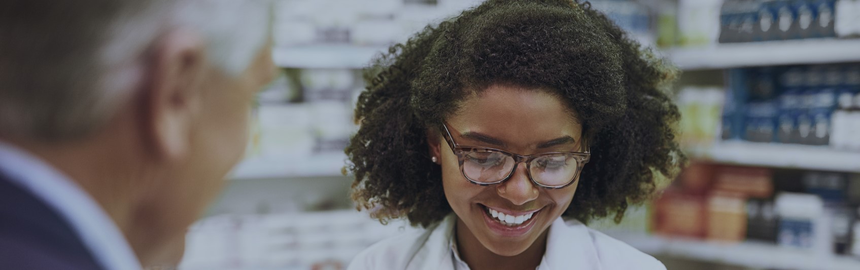 Pharmacist helping a patient