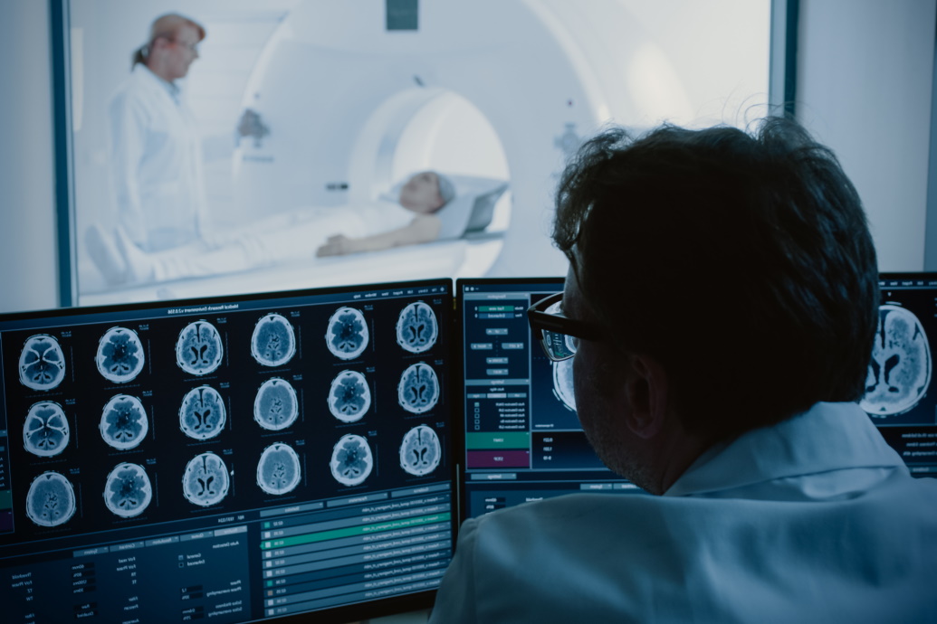 Man viewing a brain scan