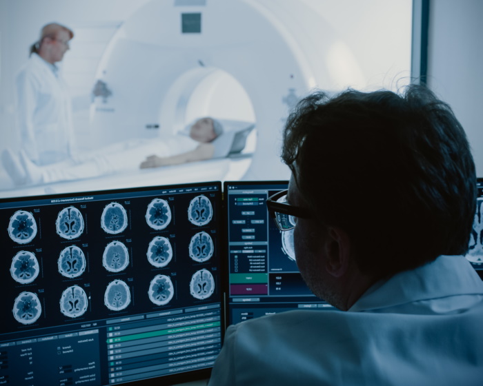 Man viewing a brain scan