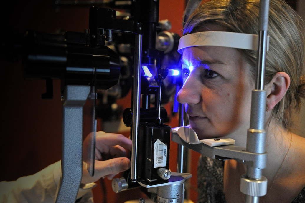 A patient getting an eye exam at the University of Maryland Eye Associates