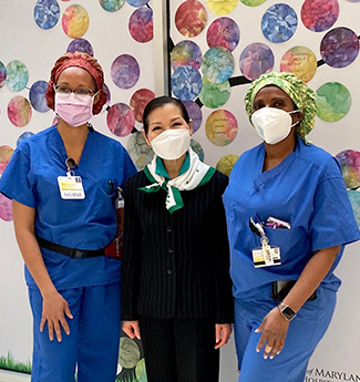 Yumi Hogan poses with Nurses