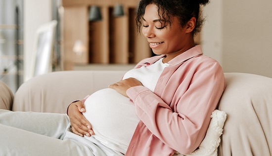 Pregnant woman smiling